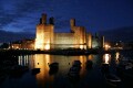 Caernarfon castle at night