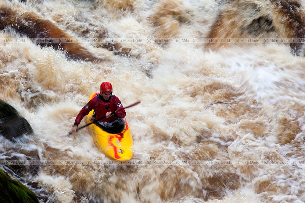 Canoeist in rapids