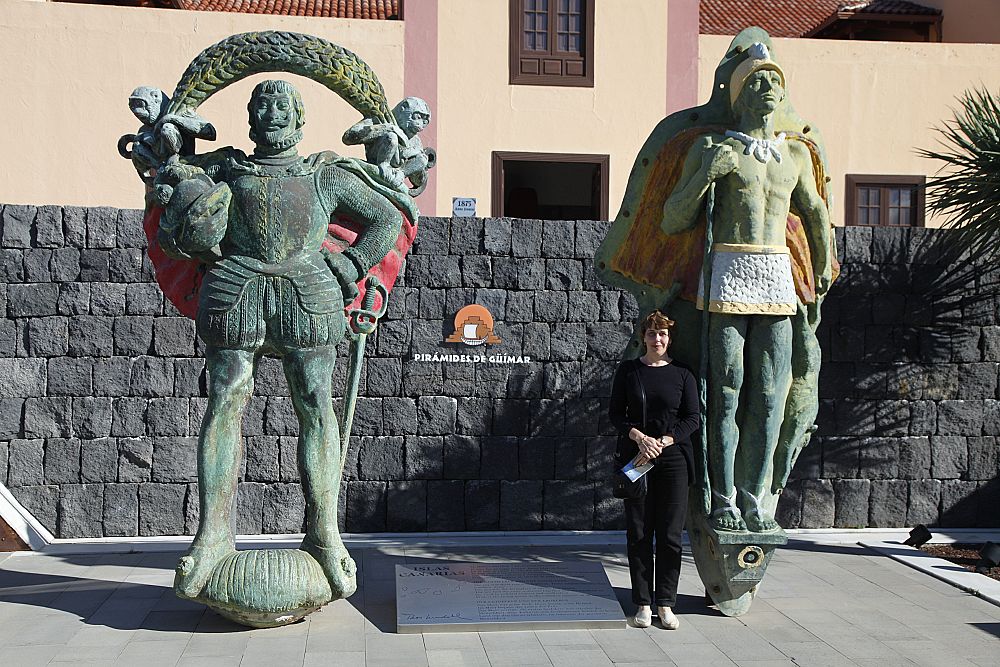 Irina with Statues of native people and Spanish invaders